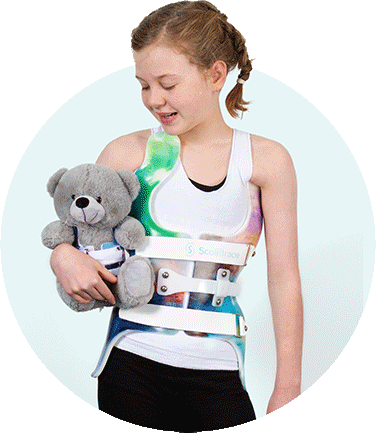 Child wearing a custom ScoliBrace at Rogue Spine Center in Portland